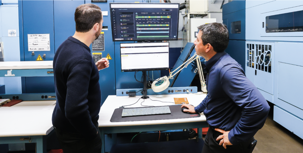 Operations Manager, Randal Leach and RPI president Hernan Ricaurte can see everything going on all 26 of RPI’s advanced machining centers from any of the workstations throughout the plant. Each display shows real time data from Datanomix (top) and ProShop (bottom) 24/7.